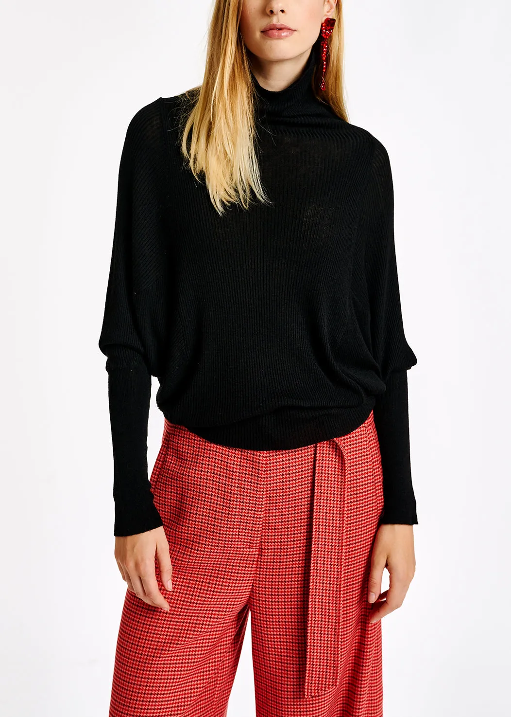 Black batwing-sleeve turtleneck sweater