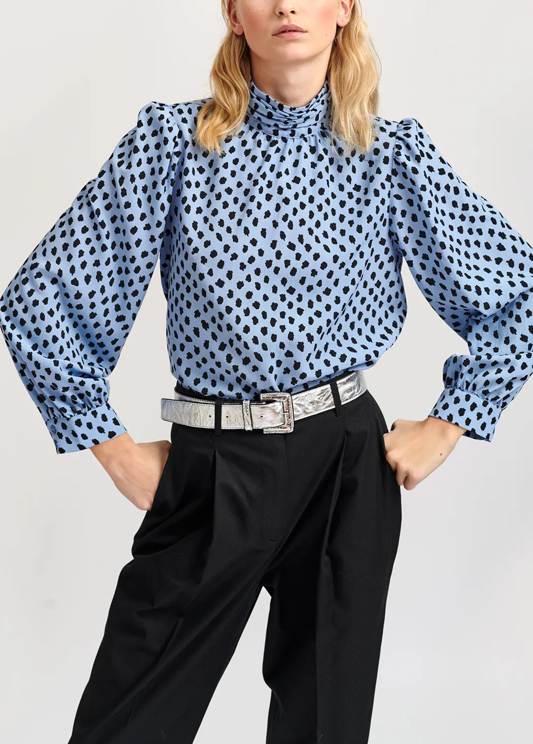 Light blue polka dot turtleneck top