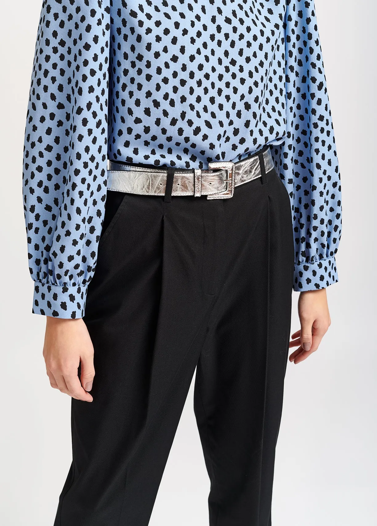 Light blue polka dot turtleneck top