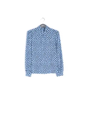 Light blue polka dot turtleneck top