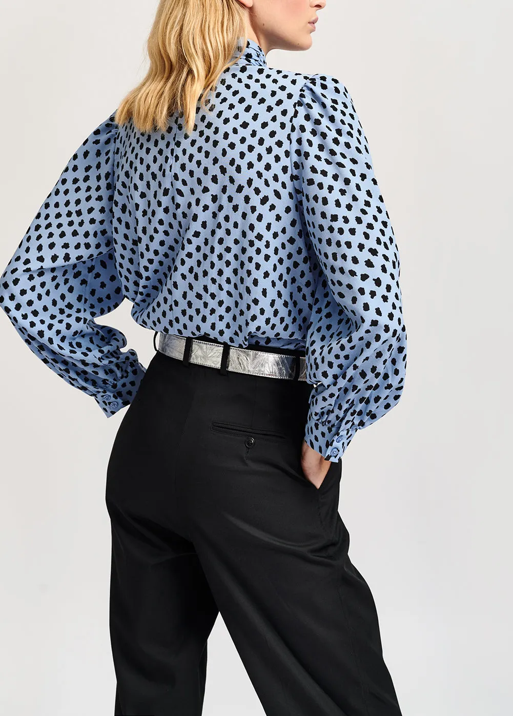 Light blue polka dot turtleneck top