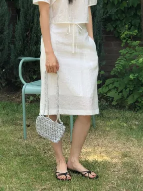 White knee-length skirt